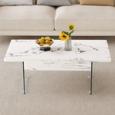 Table basse moderne à plateau relevable en faux marbre avec compartiment caché