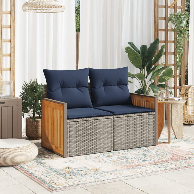 Canapé de patio en rotin noir 2 places Ebern Designs, Coussin bleu marine / structure grise
