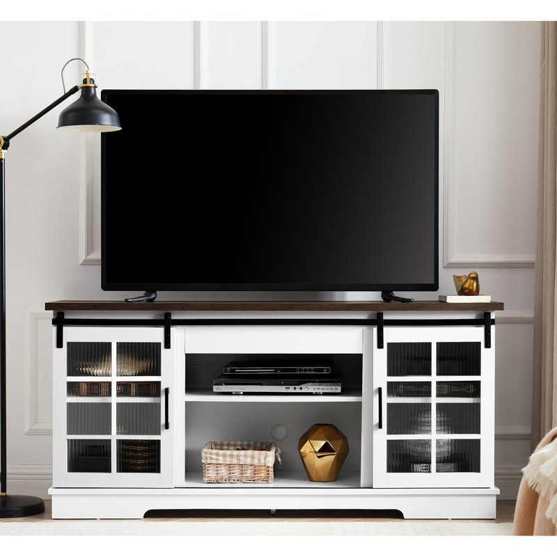 Console de télévision blanche et brune avec portes coulissantes et beaucoup de rangement pour la télé 65 po.