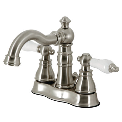 Kingston Brass American Patriot Two-Handle 3-Hole Deck Mount 4" Centerset Bathroom Faucet with Pop-Up Drain