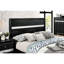 Grand lit en bois massif avec rangement en noir, aspect détente moderne