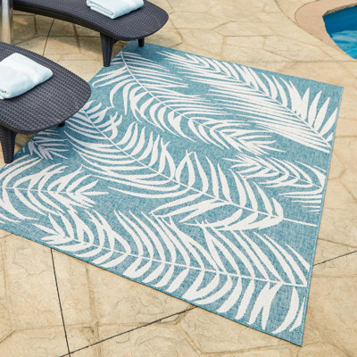Tapis intérieur / extérieur bleu sarcelle en polypropylène tissé à la machine Pinion