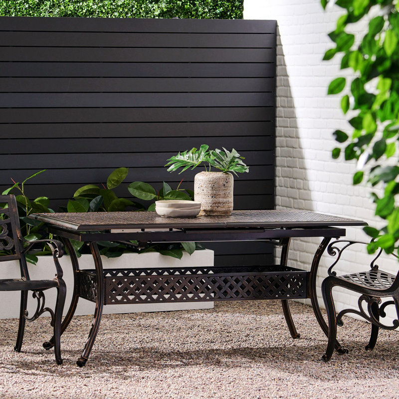 Jenisa Rectangular Metal Extendable Outdoor Dining Table With Umbrella Hole , 64'' in. W 37.50'' in. D, Shiny Copper