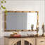 Miroir mural doré