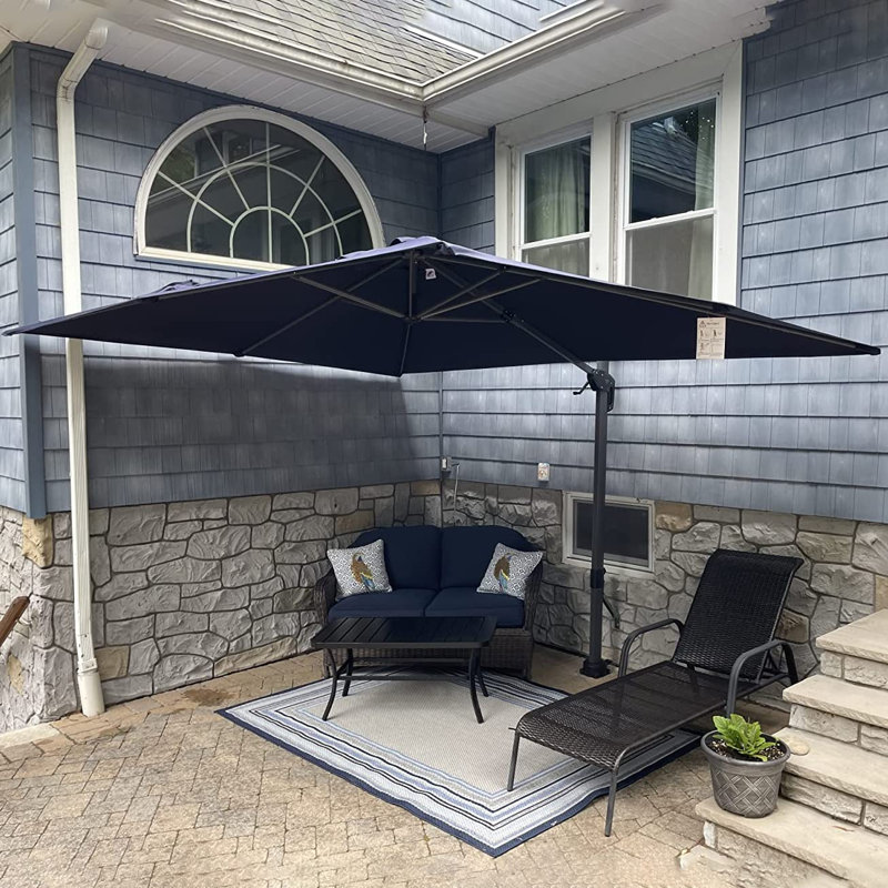 Parasol rectangulaire en porte-à-faux de 132 po x 108 po bleu marine avec base au sol et contrepoids à manivelle inclus