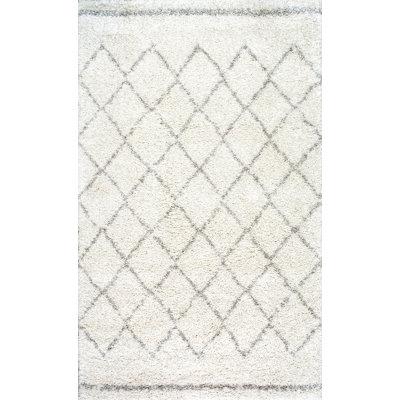 Tapis blanc cassé à motif géométrique Reva
