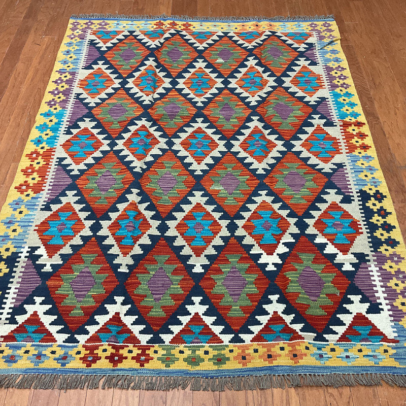Tapis jaune unique 5 pi 1 po x 6 pi 10 po Penny-Rose