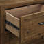 Commode brune à 5 tiroirs