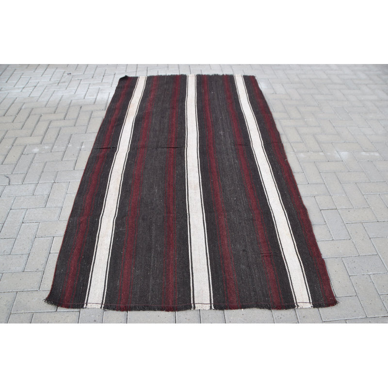 Tapis turc vintage en laine tissé à la main dans de riches rayures noires pour un décor unique