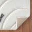 Tapis à motif géométrique crème Koo-1355611024