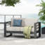 Causeuse, finition noire avec coussin beige