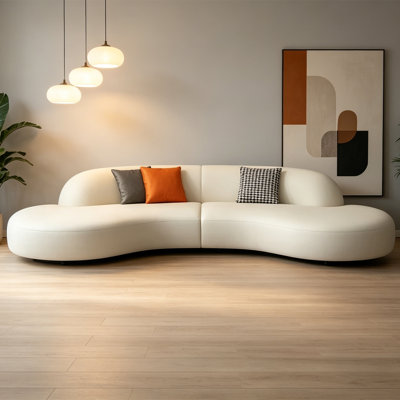 Curved white lounge area sofa