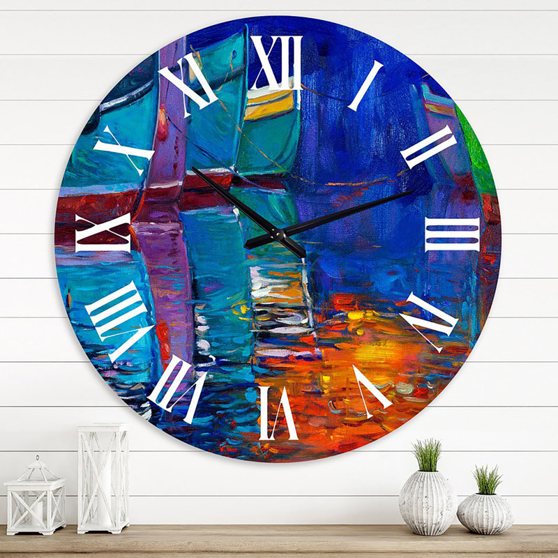Bateaux se reposant sur l'eau pendant un coucher de soleil chaud - horloge murale nautique et côtière, Moyenne