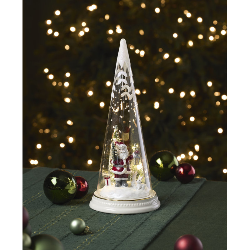 Figurine de père Noël joyeux et magique avec lanterne