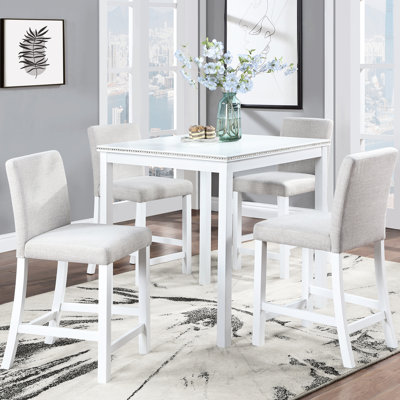 Ensemble 5 pièces de table de salle à manger et de chaises à hauteur de comptoir. Carré orné de cristaux. Matériau en bois massif élégant 5 en blanc. Décoration. Fabrication