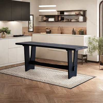 Longue table frêne noir carbonisé