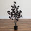3 pi. Arbre d'eucalyptus artificiel pré-éclairé noir avec 80 lumières DEL orange et mauves