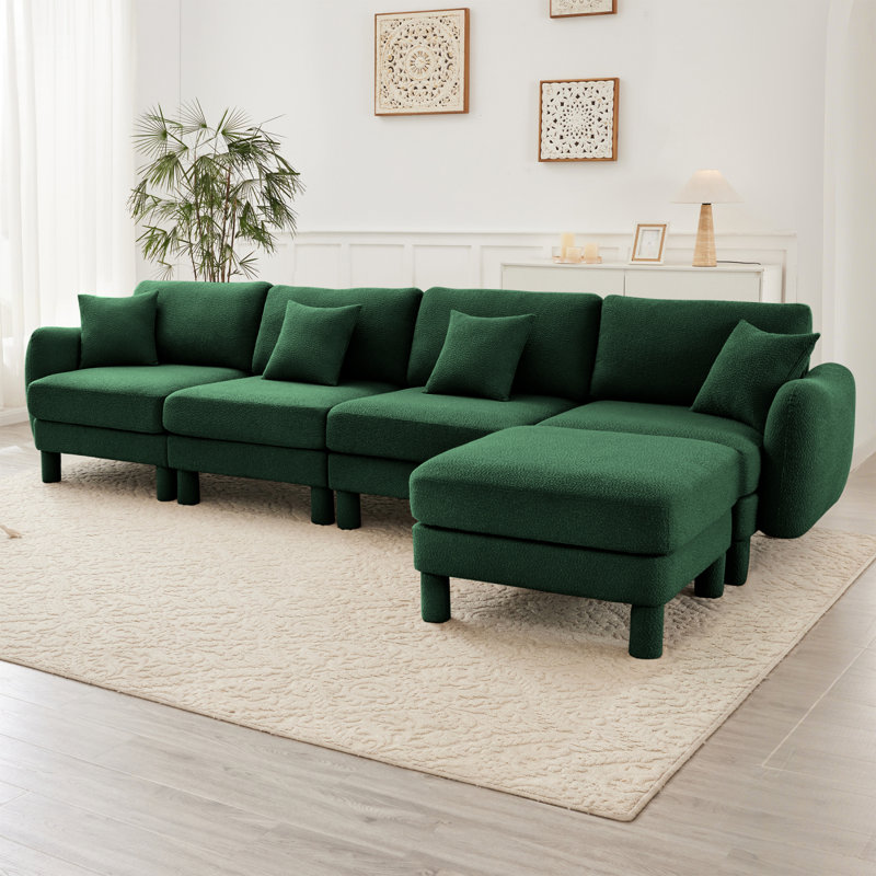 Canapé modulaire en L convertible en forme de L pour 4 personnes avec accoudoirs en forme de coquillage et repose-pieds amovible et pieds cylindriques enveloppés de tissu vert Boucle