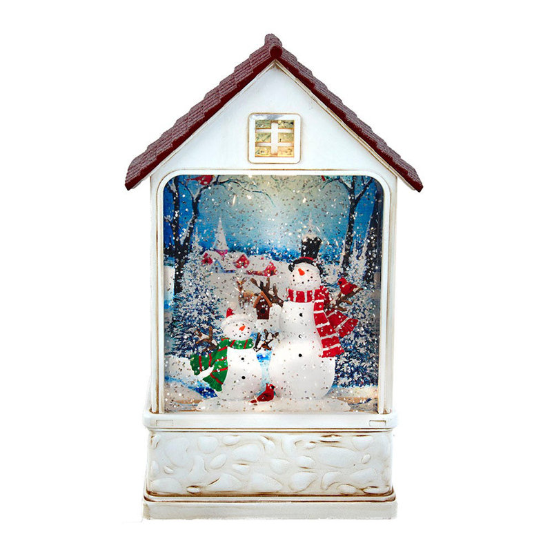 Lanterne d'eau illuminée avec bonhomme de neige