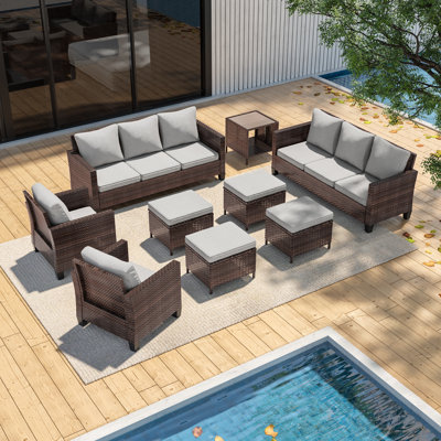 Ensemble de mobilier de patio en osier PE de Dastan 9 pièces avec 4 repose-pieds et coussins lavables amovibles, ensemble de conversation extérieur toutes saisons pour terrasse