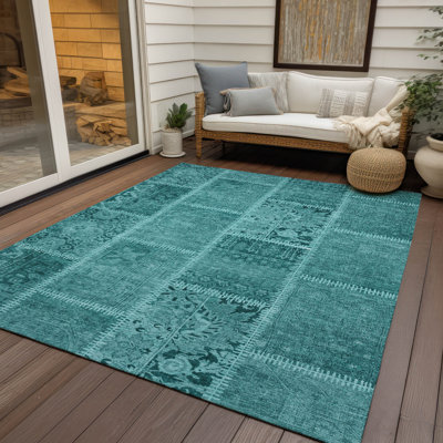 Tapis intérieur / extérieur Heffington avec envers antidérapant