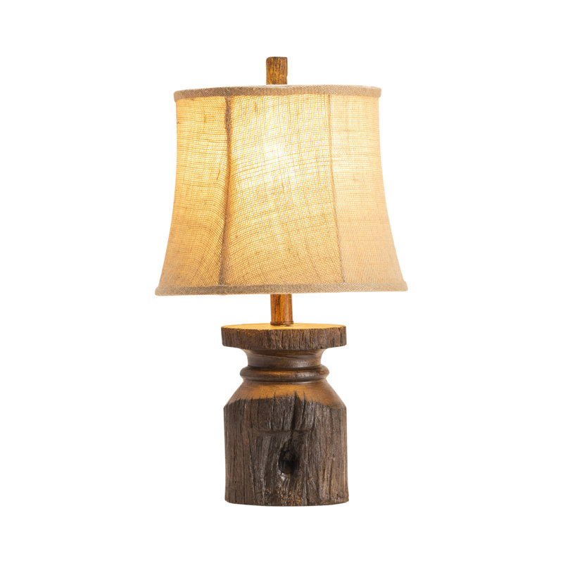 Lampe en résine brune avec base sculptée et abat-jour brun clair
