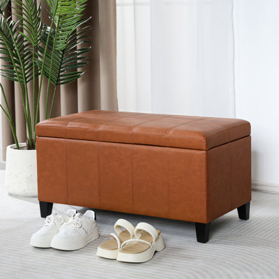 Repose-pieds de rangement en similicuir 33,6 po avec pieds en bois