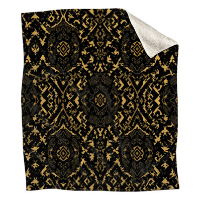 Couvertures noires et dorées Ikat