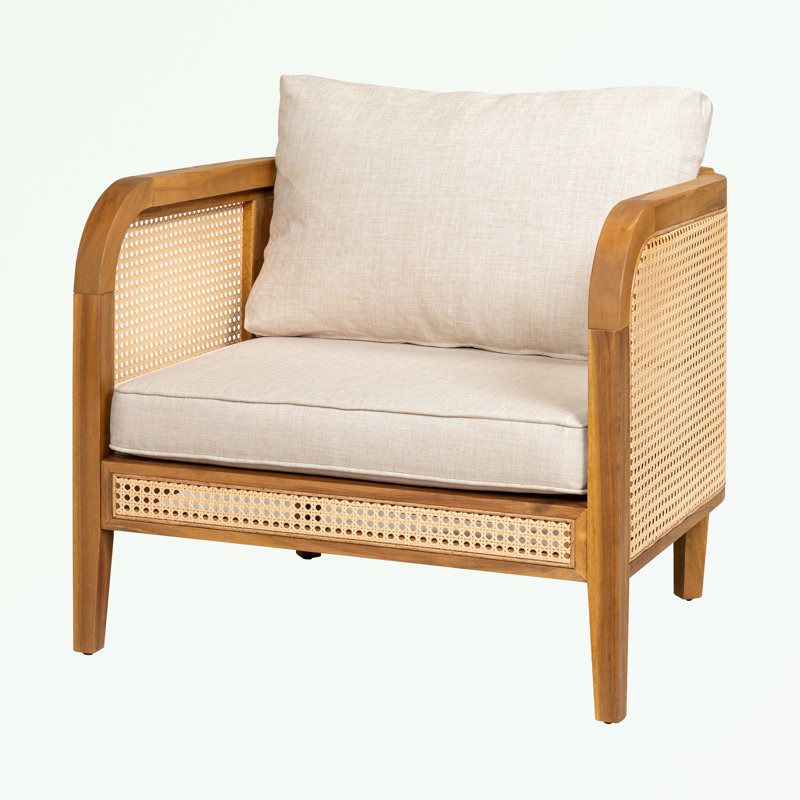 Fauteuil d'extérieur en osier avec coussin moelleux