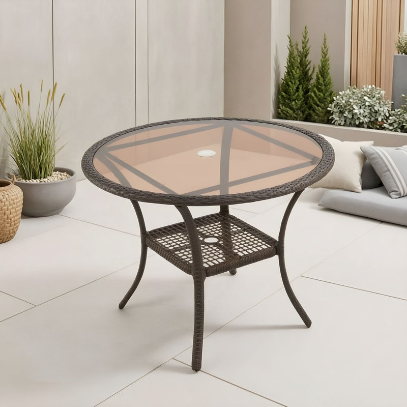 Table d'extérieur en rotin avec plateau et pieds en verre trempé