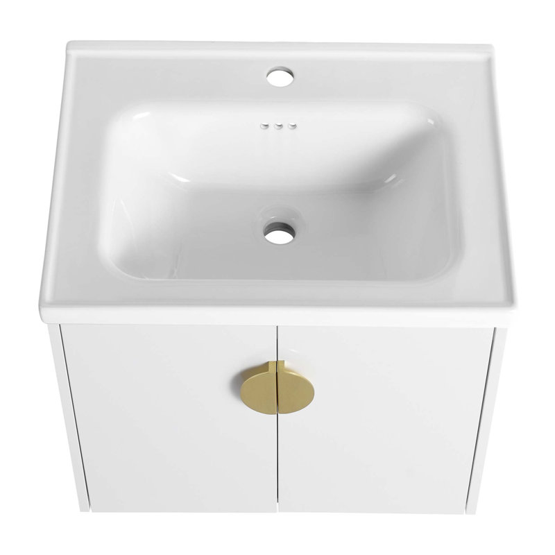 Meuble-lavabo de 60 po avec portes à fermeture en douceur avec lavabo et petites tablettes de rangement.
