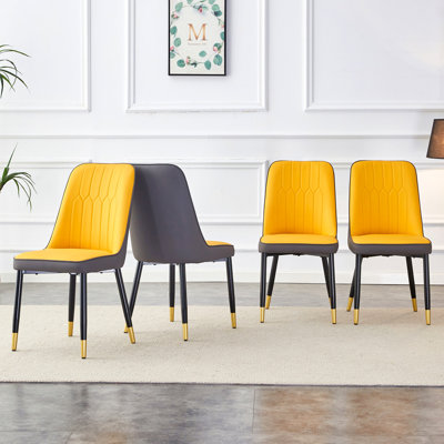 Une chaise de salle à manger moderne avec un dossier en cuir de polyuréthane bicolore jaune et gris foncé et des pieds en métal noir, idéale pour les cuisines, les chambres et les bureaux. Ensemble de 4 pièces