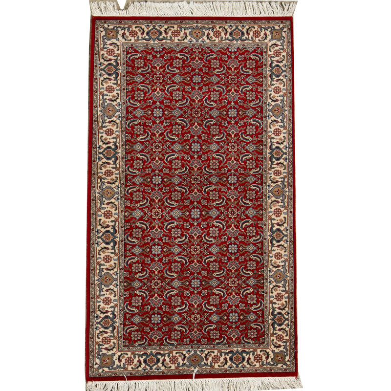 Tapis rouge et ivoire noué à la main de haute qualité