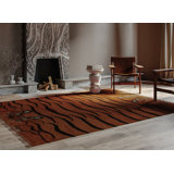 Kouang Wool Animal Print Area Rug