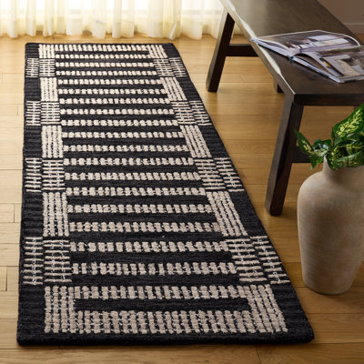 Tapis rayé en laine touffeté à la main