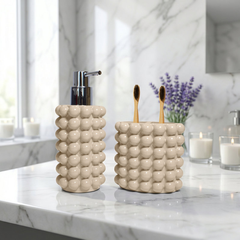 Ensemble d'accessoires de salle de bain texturé à bulles 2 pièces, distributeur de savon en résine et porte-brosse à dents pour salle de bain, chambre d'invité, appartement et dortoir Better Sand Nova Collection