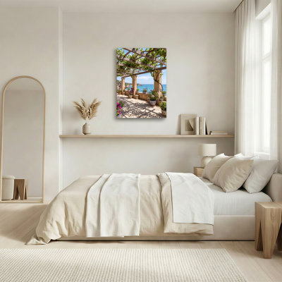 Toile en pierre avec vignes et mer bleue
