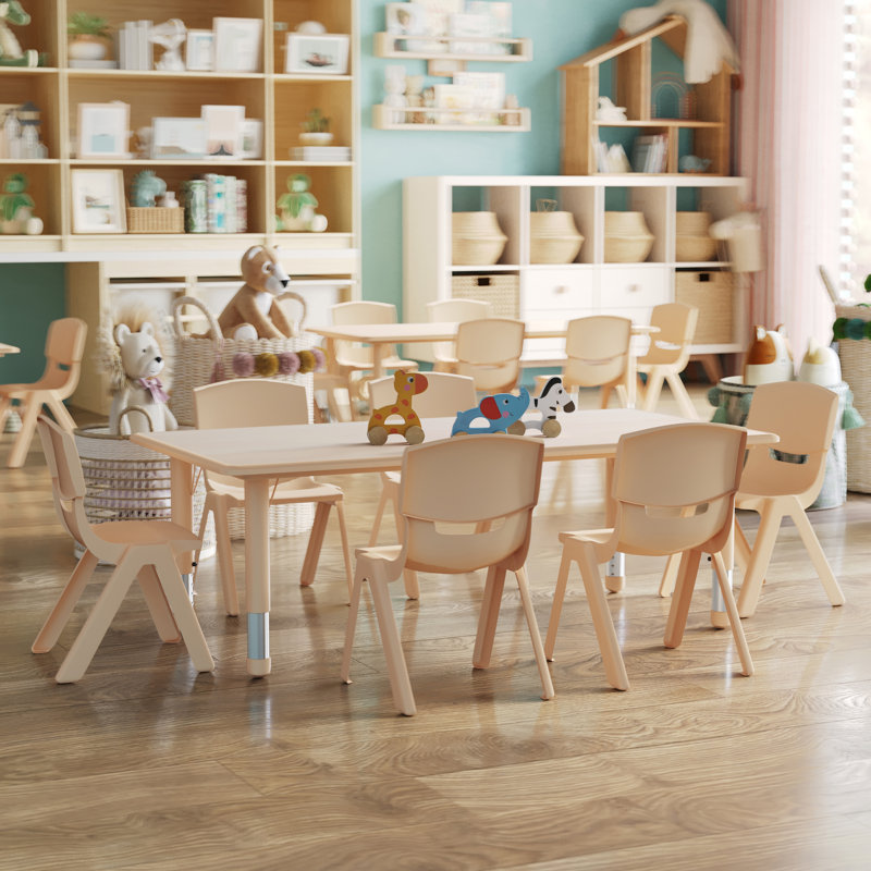 Kids activity table set in tan with four matching stackable chairs in a playroom.