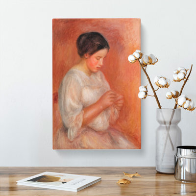Woman Sewing by Pierre-Auguste Renoir - Wrapped Canvas