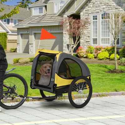 Remorque de vélo pour chien Aosom, chariot de vélo pour animal de compagnie avec cadre en acier, attache d'attelage, roues à dégagement rapide, réflecteurs, drapeau, transporteur de voyage pour chien de taille moyenne, jaune