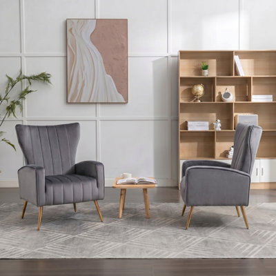 Fauteuil en velours à pieds en métal
