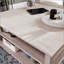 Table basse à plateau relevable avec surface spacieuse et rangement caché, parfaite pour le travail et les loisirs dans les maisons modernes