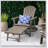 Foldable Acacia Wood Adirondack Chair With Traditional Slats, Rustic Design, And Wide Armrests For Outdoor Comfort