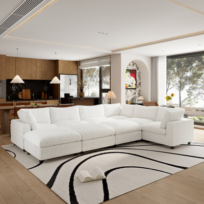 9 - Piece Upholstered Sectional With Ottoman