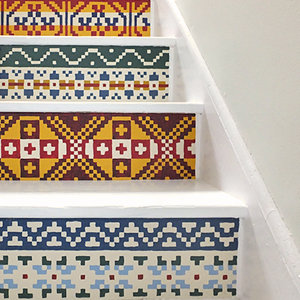 A set of hand-painted stairs renovated in a fair isle pattern