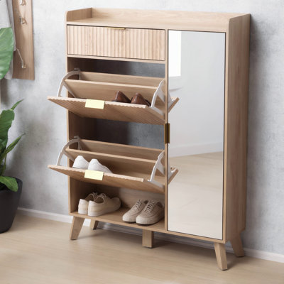 Les meubles de rangement pour chaussures de maison recueillent les chaussures pour ranger les chaussures en désordre près des entrées de maison