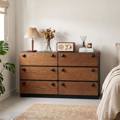 The wall-mounted cabinet in the living room