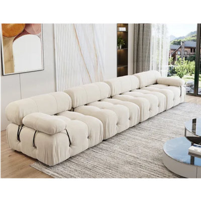Canapé modulaire rembourré 4 places avec repose-pieds, velours moelleux, dossier détachable et accoudoirs Mario Bellini