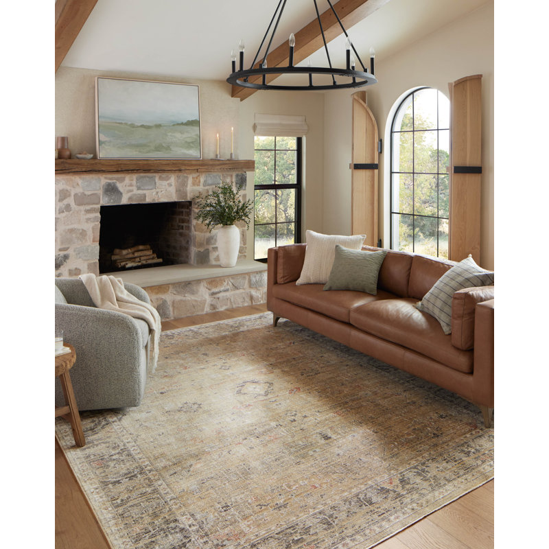 Millie Gold and Charcoal Floral Round Synthetic Area Rug