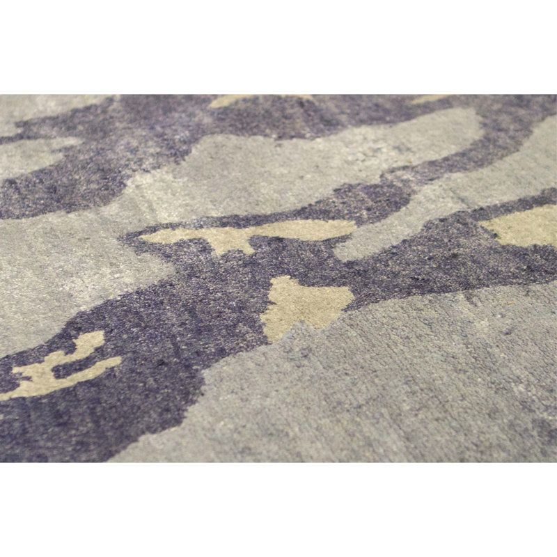 Tapis bleu de haute qualité noué à la main